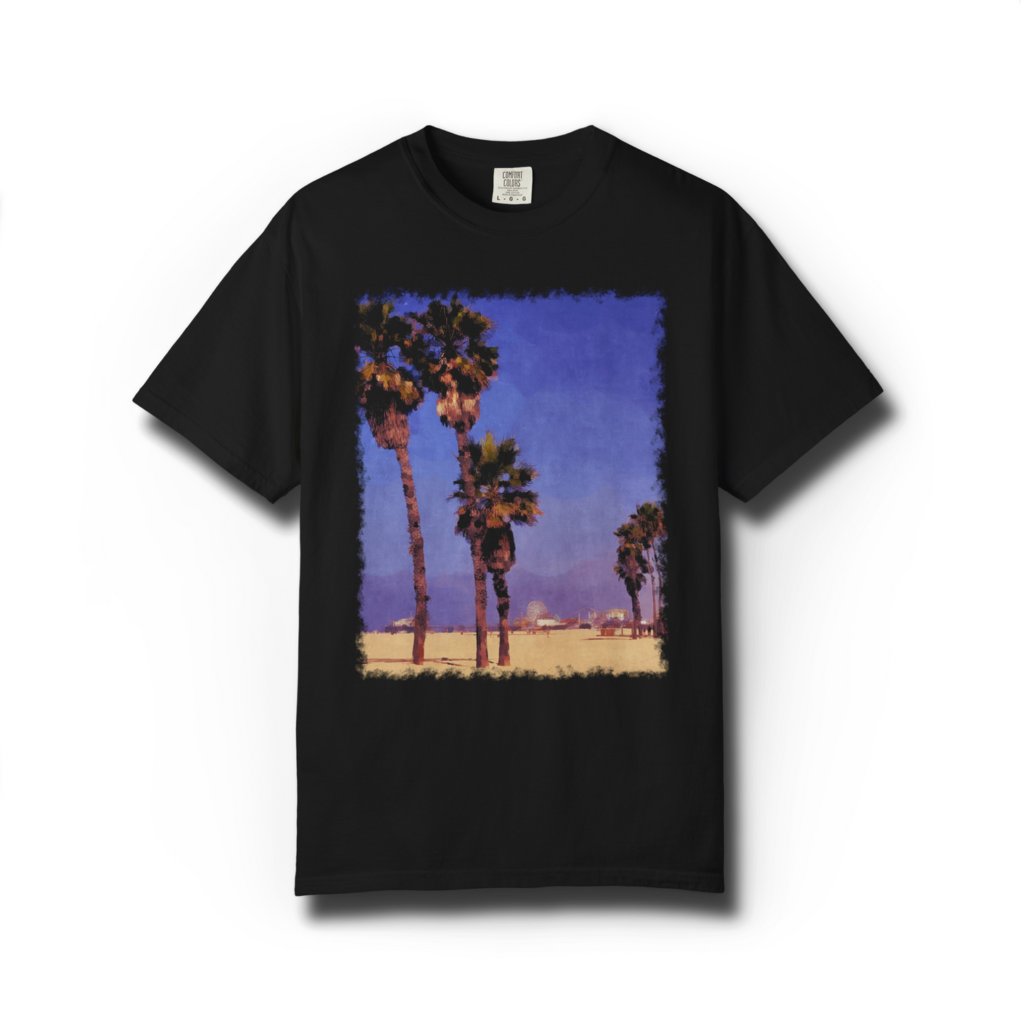 Black t-shirt with a Santa Monica Beach Graphic featuring palm trees, beach, and the Santa Monica Pier against a blue sky background