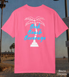 Comfort Colors cotton t-shirt Crunch Berry Pink in color featuring durable DTF back design of a white palm tree and the words Book Beach Beverage in blue.