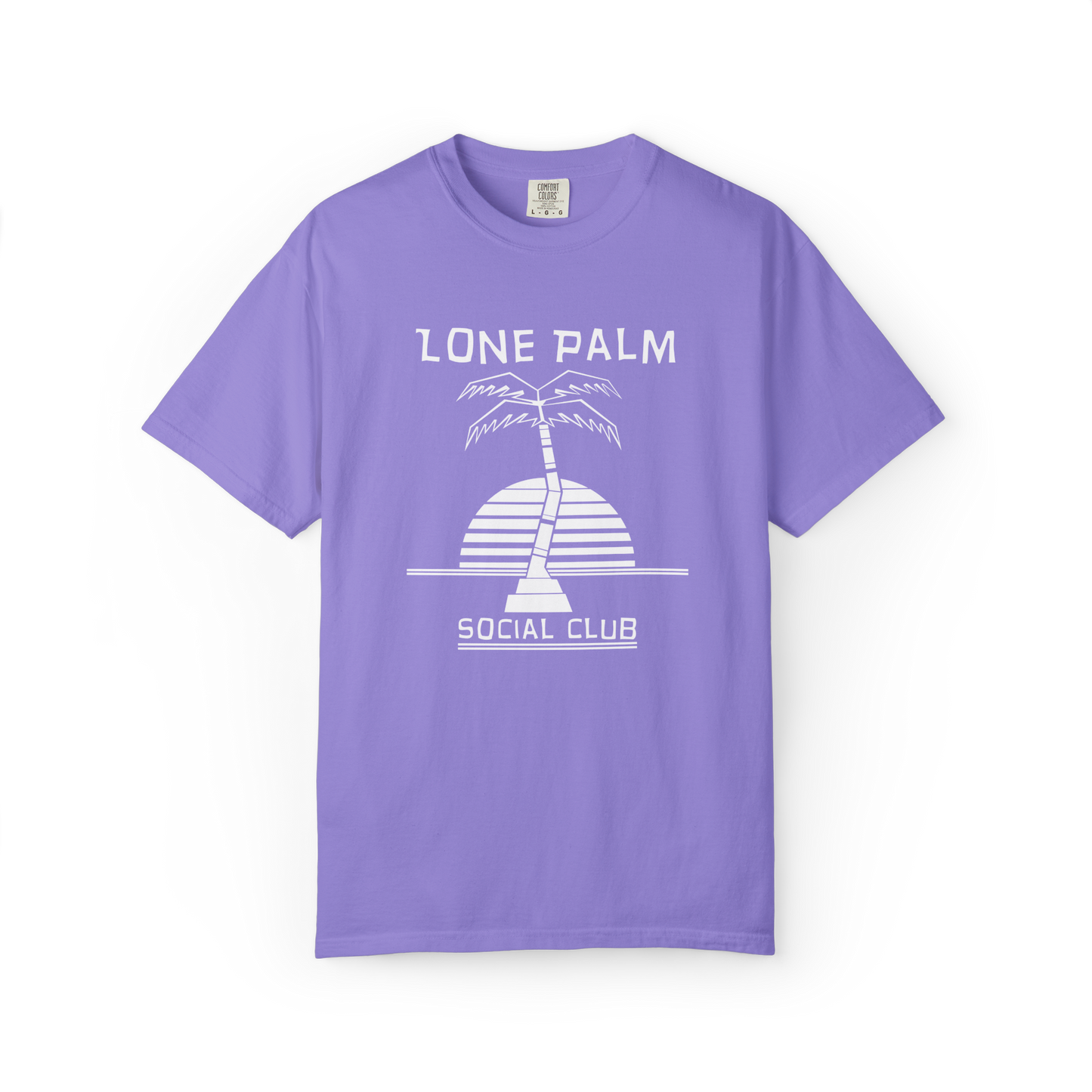 Violet purple Comfort Colors graphic t-shirt with DTF  'Lone Palm Social Club' palm tree graphic on a white background 
