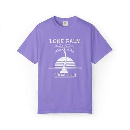 Violet purple Comfort Colors graphic t-shirt with DTF  'Lone Palm Social Club' palm tree graphic on a white background 
