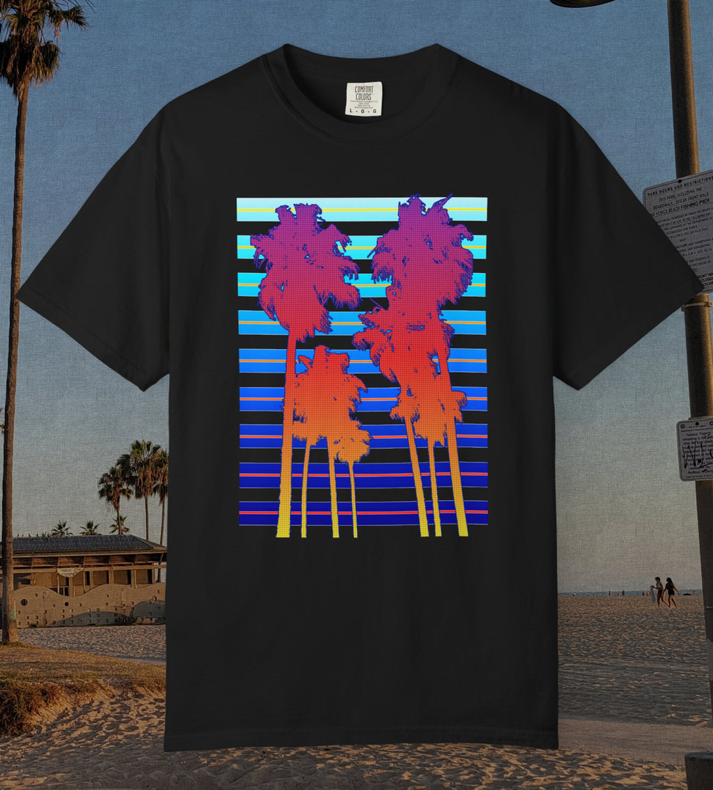 Comfort Colors cotton t-shirt black in color featuring a DTF graphic of palm tree silhouettes in warm colors with a cool color background pattern.