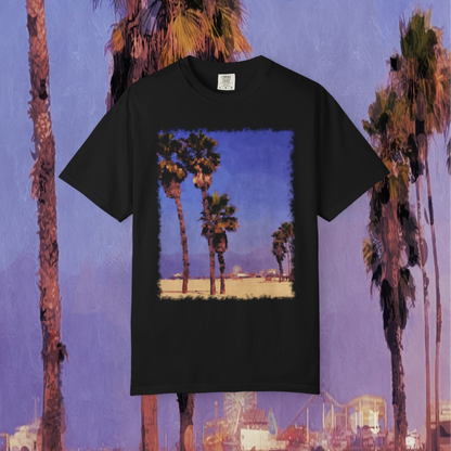 Black t-shirt with a Santa Monica Beach Graphic featuring palm trees, beach, and the Santa Monica Pier against a blue sky background