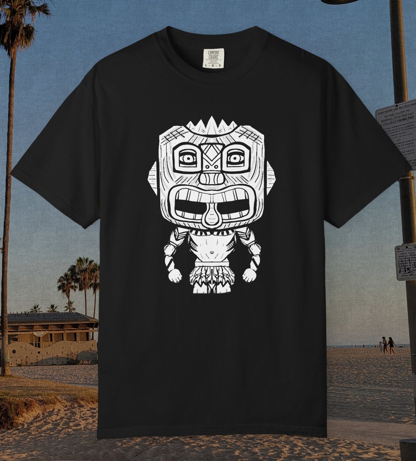Comfort Colors cotton shirt in black featuring a durable DTF image of a Polynesian Tiki guy sticking out his tongue in white