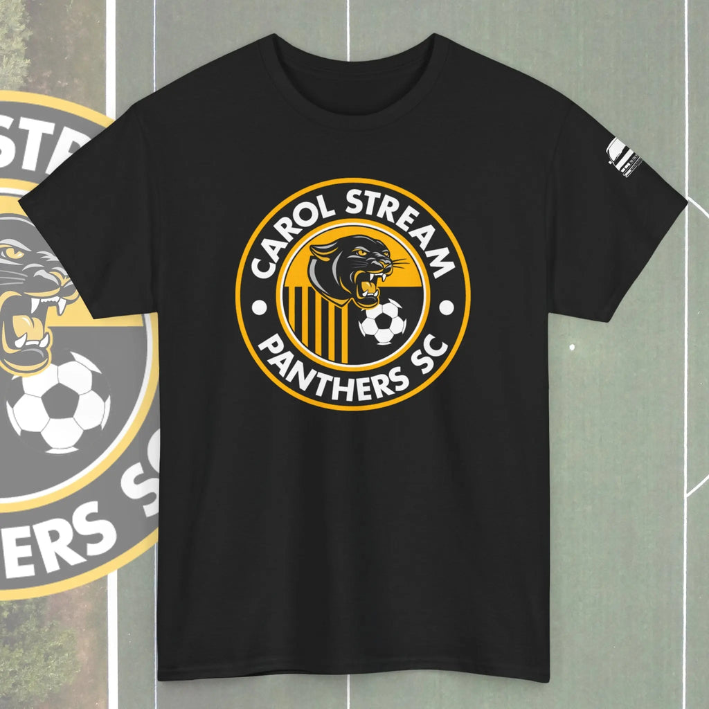 A black short-sleeve t-shirt featuring a circular 'Carol Stream Panthers SC' graphic on the chest, with a yellow and white soccer theme and a panther illustration. The shirt is displayed flat against a gray background with a blurred version of the graphic on the left.