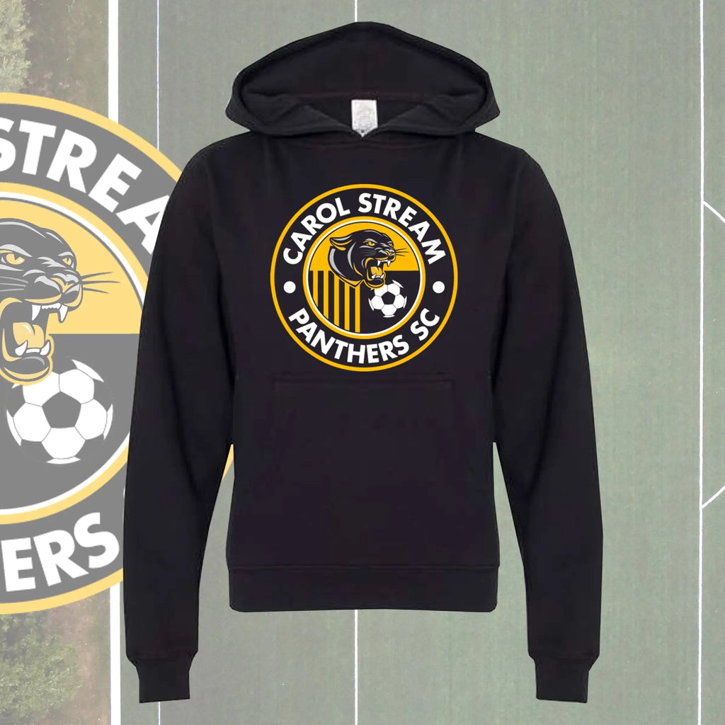 A youth black pullover hoodie featuring a circular 'Carol Stream Panthers SC' graphic on the chest, displayed against a green soccer field background with a team logo partially visible on the left.